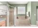 Bathroom with a large tub and shower at 9882 Sw 89Th Lane Rd, Ocala, FL 34481