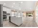 Open concept kitchen with breakfast bar and living room access at 7867 Sw 74Th Loop, Ocala, FL 34481