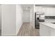 Long hallway with tile floors and white walls at 7867 Sw 74Th Loop, Ocala, FL 34481