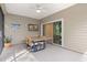 Screened patio with outdoor seating and backyard view at 7867 Sw 74Th Loop, Ocala, FL 34481