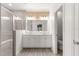 Double vanity bathroom with a large shower and toilet at 7867 Sw 74Th Loop, Ocala, FL 34481