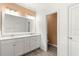 Double vanity bathroom with a separate toilet area at 7867 Sw 74Th Loop, Ocala, FL 34481