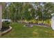 Backyard with lush lawn and mature trees at 7867 Sw 74Th Loop, Ocala, FL 34481