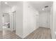 Bright hallway with tile flooring, leading to bedrooms and other rooms at 7867 Sw 74Th Loop, Ocala, FL 34481