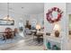 Spacious dining room with hardwood floors and a chandelier at 12333 Se 177Th Loop, Summerfield, FL 34491