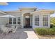 Home exterior with patio and landscaping at 12333 Se 177Th Loop, Summerfield, FL 34491
