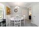 Bright dining area with white table and chairs at 9357 Sw 82Nd Ter # B, Ocala, FL 34481