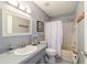 Clean bathroom with a tub, shower, and vanity at 9357 Sw 82Nd Ter # B, Ocala, FL 34481