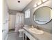 Clean bathroom with a shower/tub combo and a vanity at 9357 Sw 82Nd Ter # B, Ocala, FL 34481