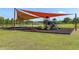 playground with shade structure and benches at 9357 Sw 82Nd Ter # B, Ocala, FL 34481