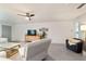 Living room with ceiling fan and comfy seating at 9357 Sw 82Nd Ter # B, Ocala, FL 34481