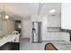 Updated kitchen with stainless steel appliances and granite countertops at 9357 Sw 82Nd Ter # B, Ocala, FL 34481