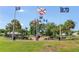 Community memorial park with various flags and benches at 9357 Sw 82Nd Ter # B, Ocala, FL 34481
