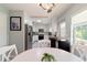 Modern kitchen with white cabinets, stainless steel appliances at 9357 Sw 82Nd Ter # B, Ocala, FL 34481
