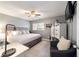 Main bedroom with a king-size bed and a sitting area at 9357 Sw 82Nd Ter # B, Ocala, FL 34481