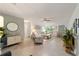 Open living room with light tile floors and comfortable seating at 9357 Sw 82Nd Ter # B, Ocala, FL 34481