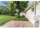 Private backyard with patio and lush green grass at 9357 Sw 82Nd Ter # B, Ocala, FL 34481