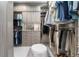 Large walk-in closet with ample hanging space and drawers at 22422 Lake Seneca Rd, Eustis, FL 32736
