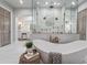 Spa-like bathroom with soaking tub and large shower at 22422 Lake Seneca Rd, Eustis, FL 32736
