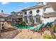 Luxury pool with comfortable lounge chairs for ultimate relaxation at 22422 Lake Seneca Rd, Eustis, FL 32736