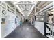 Clean and bright barn interior with multiple stalls for horses at 22422 Lake Seneca Rd, Eustis, FL 32736