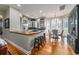 Kitchen features island with breakfast bar and view to backyard at 22422 Lake Seneca Rd, Eustis, FL 32736
