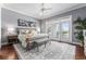 Main bedroom with hardwood floors and access to balcony at 22422 Lake Seneca Rd, Eustis, FL 32736