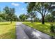 Long driveway leading to the home, offering privacy and curb appeal at 22422 Lake Seneca Rd, Eustis, FL 32736