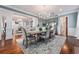 Elegant dining room with hardwood floors and a chandelier at 22422 Lake Seneca Rd, Eustis, FL 32736
