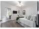 Comfortable bedroom with access to a private patio at 22422 Lake Seneca Rd, Eustis, FL 32736
