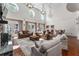 Spacious great room with high ceilings, a fireplace, and comfortable seating at 22422 Lake Seneca Rd, Eustis, FL 32736