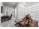 Home office with built-in shelving and hardwood floors at 22422 Lake Seneca Rd, Eustis, FL 32736