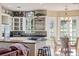 Bright kitchen boasts stainless steel appliances and ample counter space at 22422 Lake Seneca Rd, Eustis, FL 32736