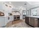 Gourmet kitchen featuring a Wolf range and white cabinetry at 22422 Lake Seneca Rd, Eustis, FL 32736