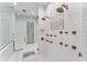 Luxury shower with multiple shower heads and mosaic tile at 22422 Lake Seneca Rd, Eustis, FL 32736
