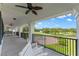 Spacious balcony with a fountain view at 22422 Lake Seneca Rd, Eustis, FL 32736