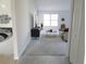 Open living space featuring a comfortable seating area and large windows at 4473 Nw 48Th Ln, Ocala, FL 34474