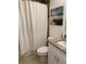 Updated bathroom with a shower/tub combo and white vanity at 5900 Nw 59Th Ct, Ocala, FL 34482