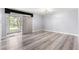 Spacious living room with sliding doors leading to a patio at 551 Fairways Dr # A, Ocala, FL 34472