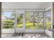 Sunroom with view of backyard and surrounding landscape at 551 Fairways Dr # A, Ocala, FL 34472