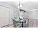 Dining area with a round glass table and four chairs at 551 Fairways Dr # A, Ocala, FL 34472