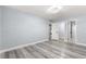 Bedroom with access to laundry and bathroom at 551 Fairways Dr # A, Ocala, FL 34472
