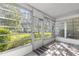 Bright sunroom showcasing a view of the community at 551 Fairways Dr # A, Ocala, FL 34472