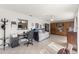 Home office with built-in shelving and a desk at 8475 Se 137Th Loop, Summerfield, FL 34491