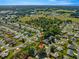 Aerial view of the house and surrounding landscape at 8475 Se 137Th Loop, Summerfield, FL 34491