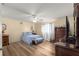 Large bedroom with a queen bed and ample closet space at 8475 Se 137Th Loop, Summerfield, FL 34491