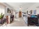 Sunroom features a daybed and access to the outdoors at 8475 Se 137Th Loop, Summerfield, FL 34491