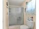 Simple bathroom with shower and toilet at 8475 Se 137Th Loop, Summerfield, FL 34491