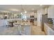 Modern kitchen with large island and stainless steel appliances at 4737 Nw 39Th Street Rd, Ocala, FL 34482