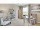 Bright home office with a glass desk and comfortable chair at 4743 Nw 39Th Street Rd, Ocala, FL 34482